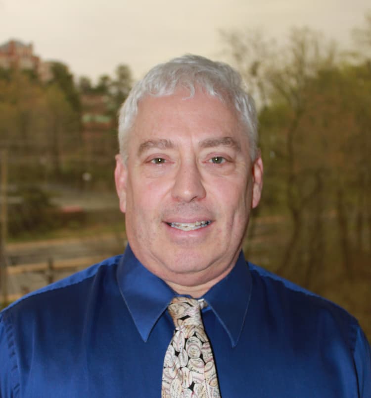 Dr. Michael E. April